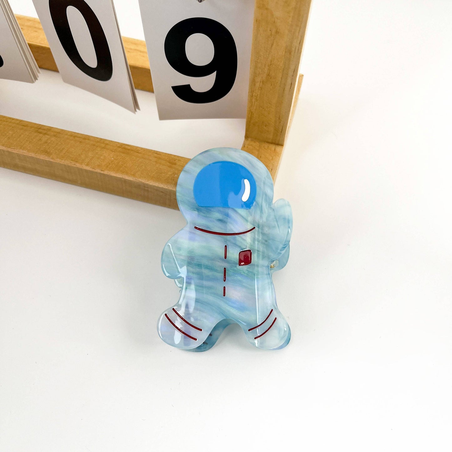 Creative astronaut say Hi hair claw clip