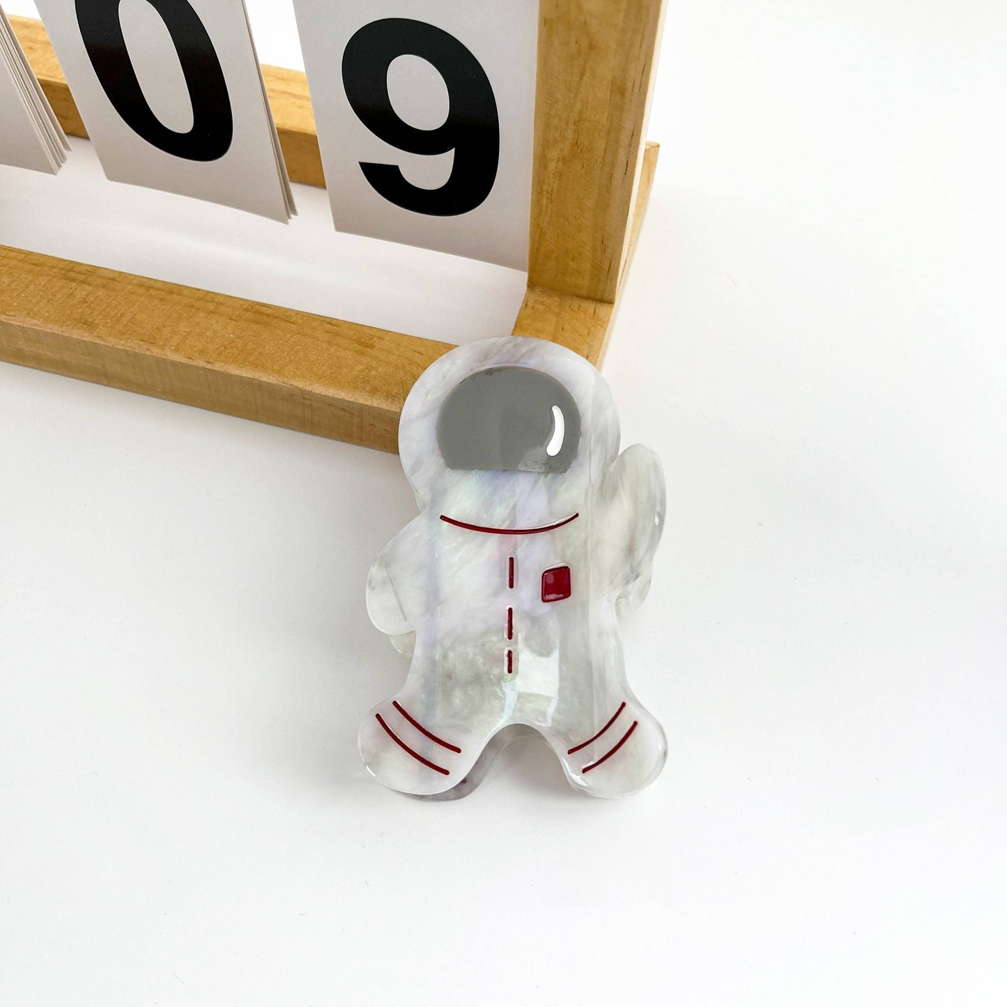 Creative astronaut say Hi hair claw clip