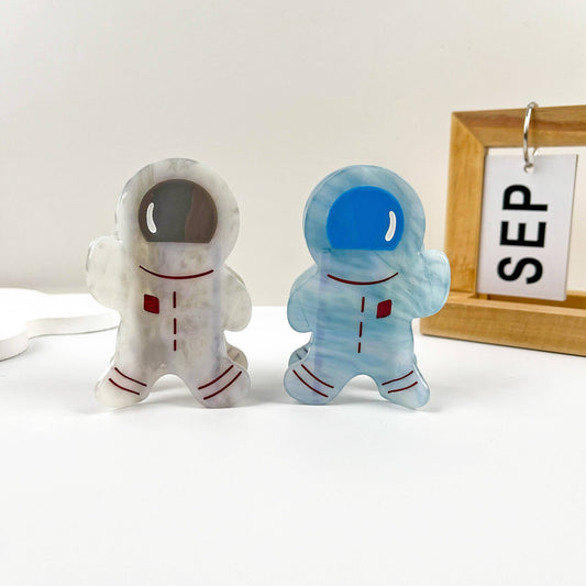 Creative astronaut say Hi hair claw clip