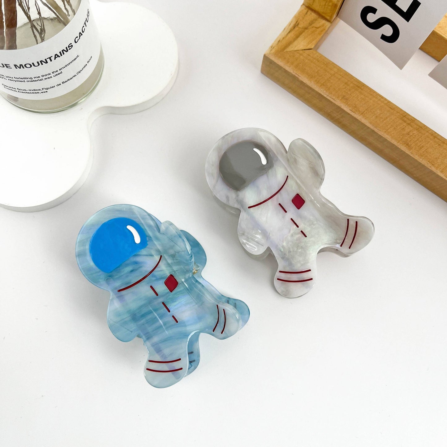 Creative astronaut say Hi hair claw clip